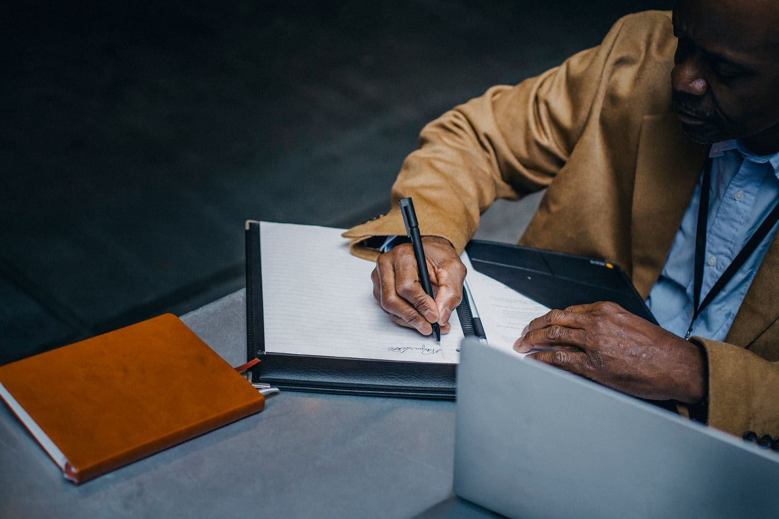Business owner working through the day's records