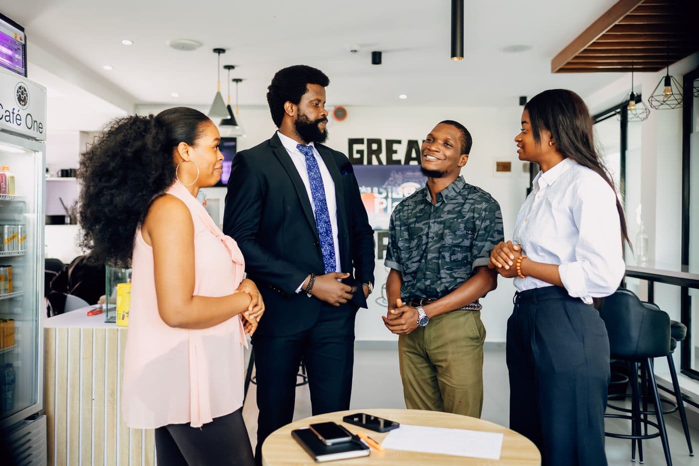 Team meeting in a Lagos office reviewing business performance
