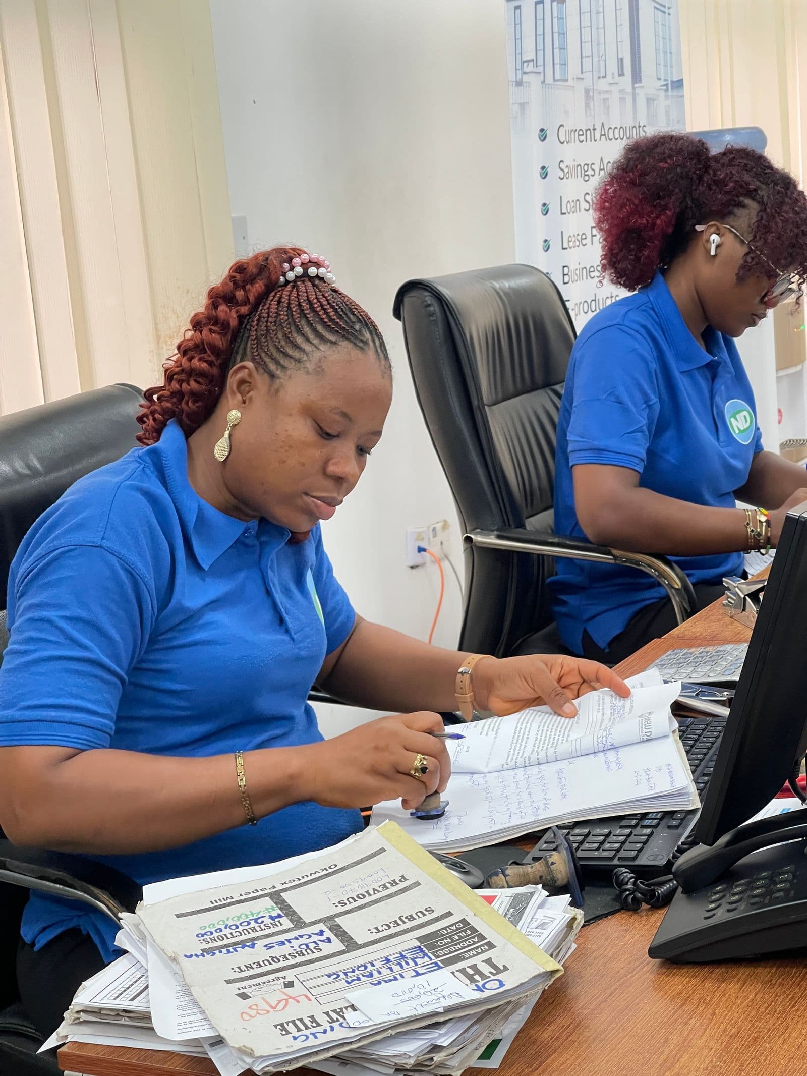 Finance and operations staff working through records at a growing company