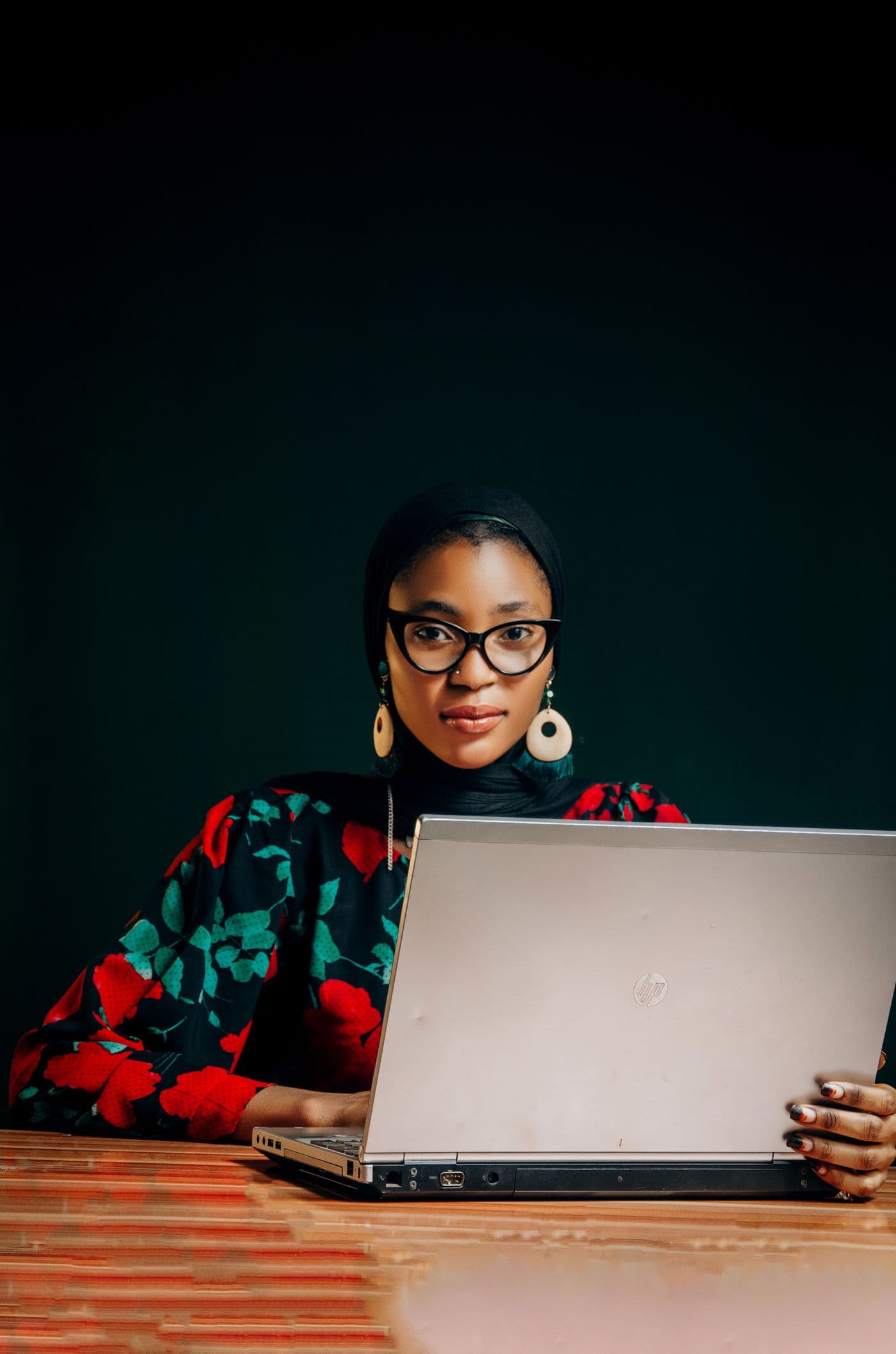 Business owner scheduling payouts on a laptop