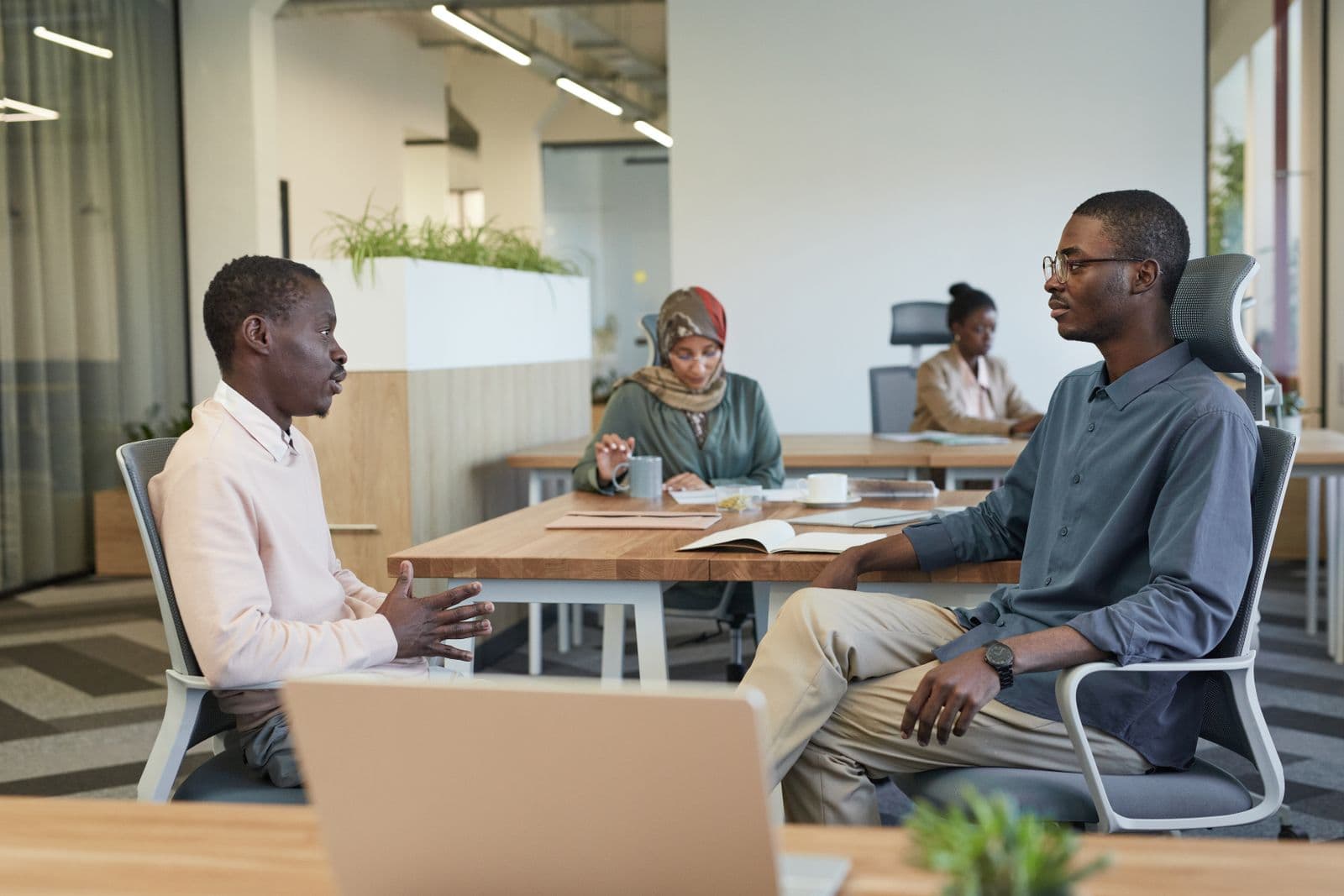 Enterprise team meeting in a modern corporate office